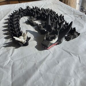 Black Dragon Figurine with White Accents
